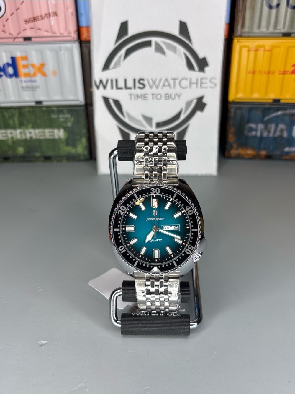 Poedagar Teal Dial Quartz Dive Watch with Silver Bracelet
